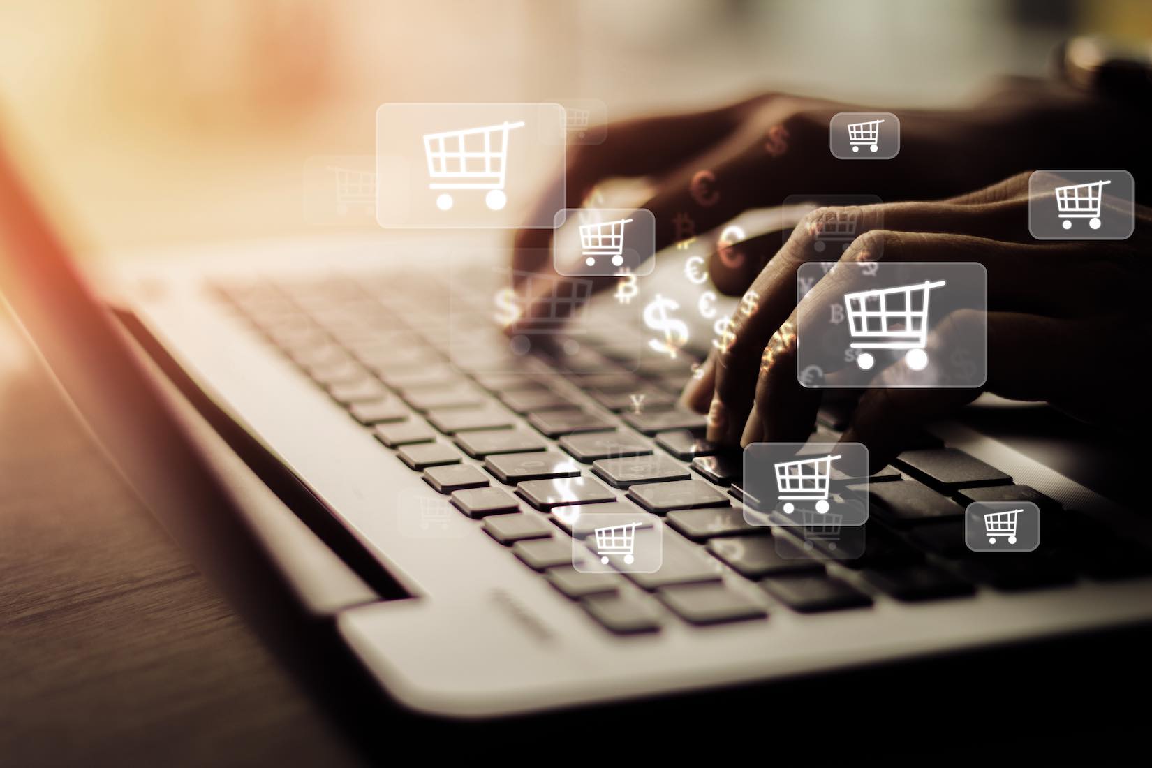 cart-icons-and-computer-signifying-ecommerce-web-design